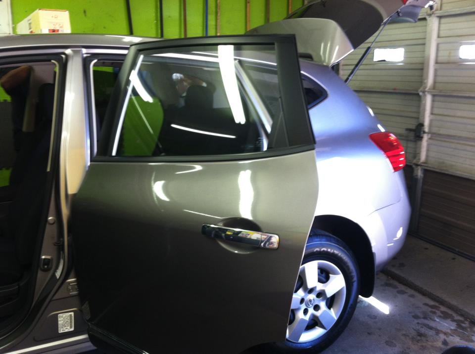 Sun Auto Glass, Windshield Repair & Tint Specialist 12' Nissan Rogue tint rear 1/2 only