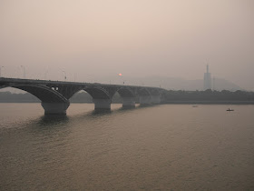 sun setting behind Juzizhou Bridge (橘子洲大桥) in Changsha
