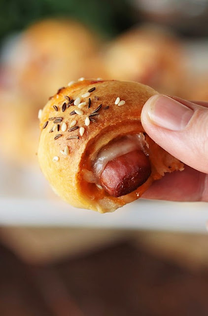Reuben Pigs In a Blanket Topped with Caraway Seeds Image
