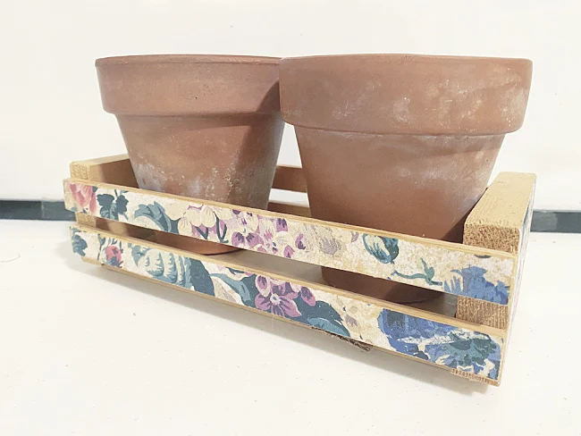 floral crate with 2 terra cotta pots