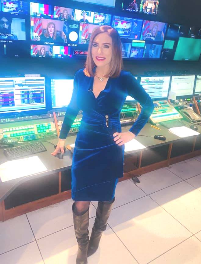 THE APPRECIATION OF NEWSWOMEN WEARING BOOTS BLOG ERIN LOGAN IS THE