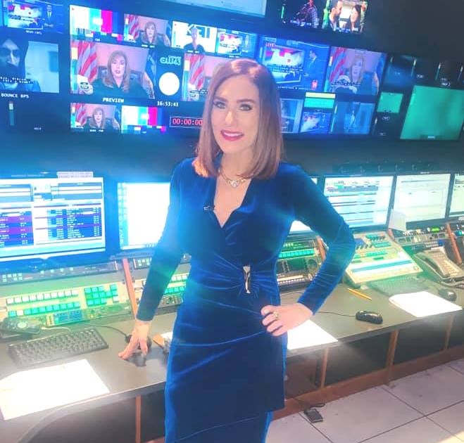 THE APPRECIATION OF NEWSWOMEN WEARING BOOTS BLOG ERIN LOGAN IS THE