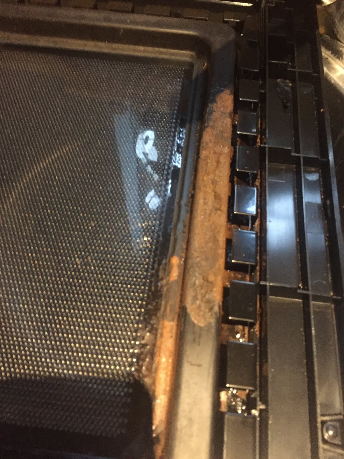 Repairing a Bosch microwave oven with a rusty door