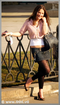 Girl in jean skirt on the street