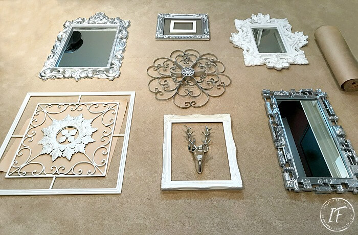 A Budget Glitz And Glam Gallery Wall Idea with upcycled thrift store mirrors and frames along with tips on how to hang gallery art the easy no measure way.