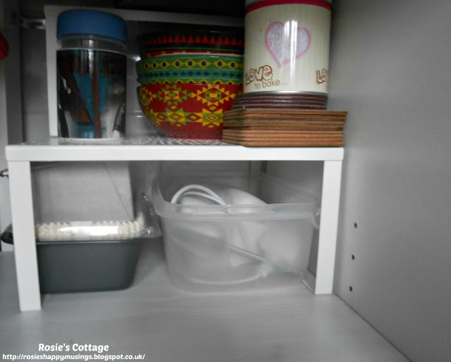 Kitchen Cabinet Re-Organisation: This is a very deep cabinet so I use Ikea shelf inserts to make the most of the space at the back.