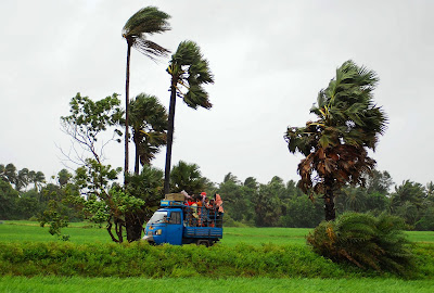 A huge cyclone that has forced as many as 500,000 people to flee their homes has made landfall in eastern India.