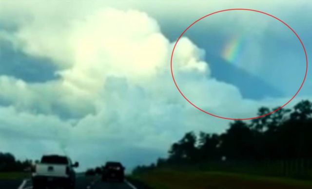 Man records rare dark straight line blocking a rainbow  Sky%2Bphenomenon%2Bstrange%2Bclouds