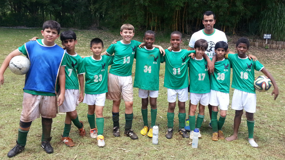 Brasilia International School Athletics Tough Soccer on the Mud