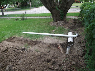 assembling PVC pipe for drainage in the backyard, roof drain, gutter