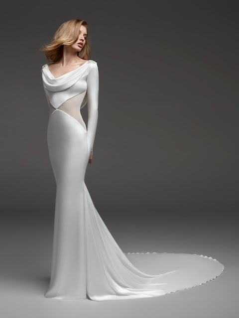 CARMIN - ow-waist mermaid dress that successfully combines sensual illusions with the diamond-shaped, sheer details of the bodice and the flow of the draped neckline and back adorned with beaded details at the shoulders K'Mich Weddings - wedding planning - wedding dresses - carmin - pronovias - fall 2019 collection