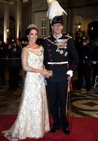 Crown Princess Mary wore a fuchsia silk dress, Princess Marie wore Rikke Gudnitz dress and tiara. Princess Elisabeth by Order of the Elephant