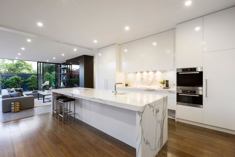 white-marble-kitchen-polished-wooden-floor