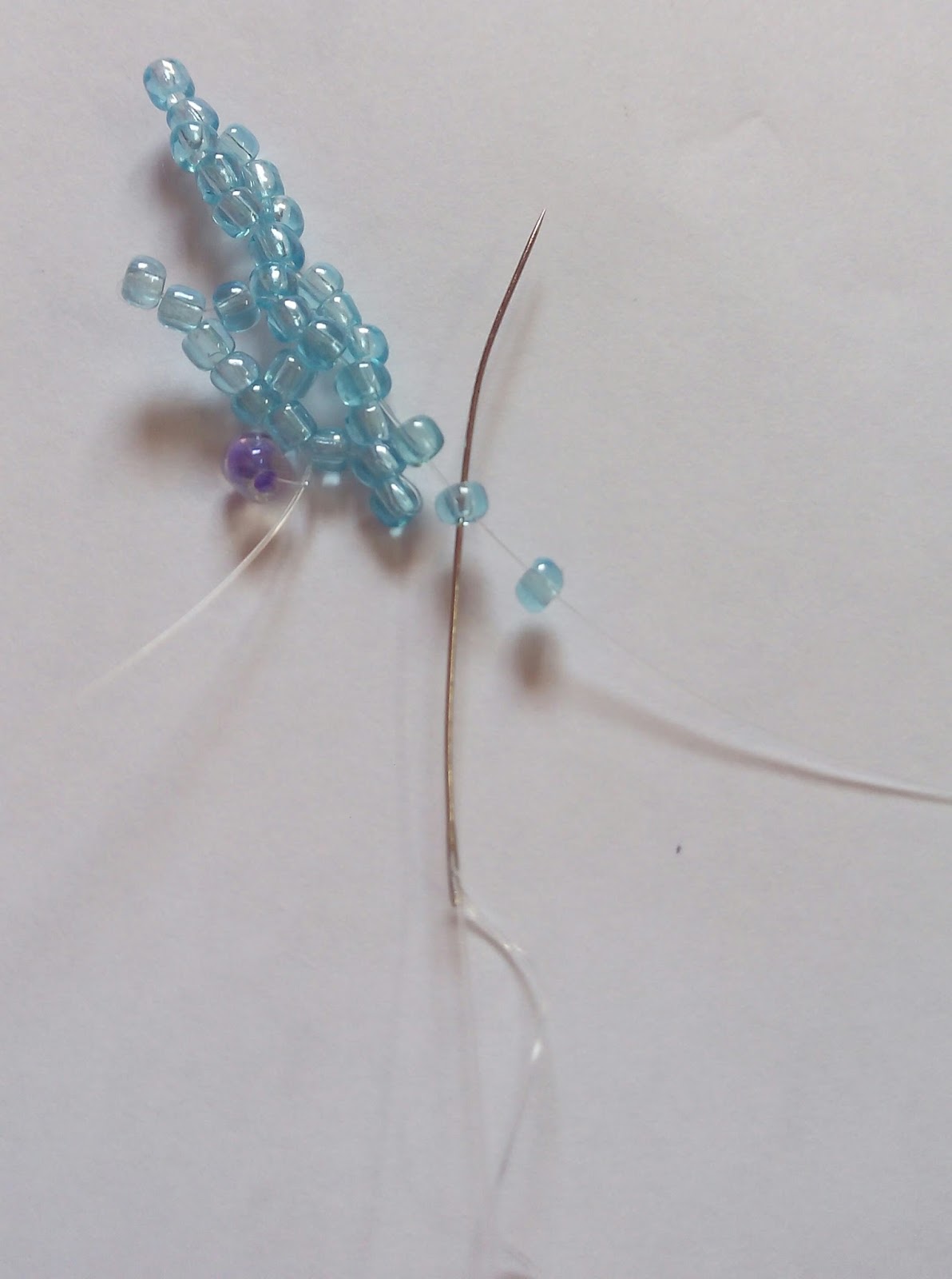 Beadination Beautiful beaded flower using the bead netting technique.