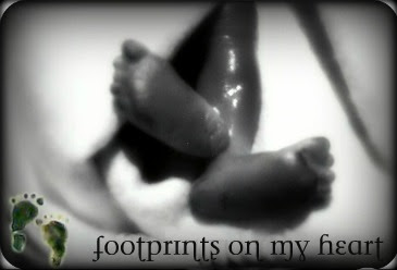 Precious tiny feet (and his prints from the birth certificate)