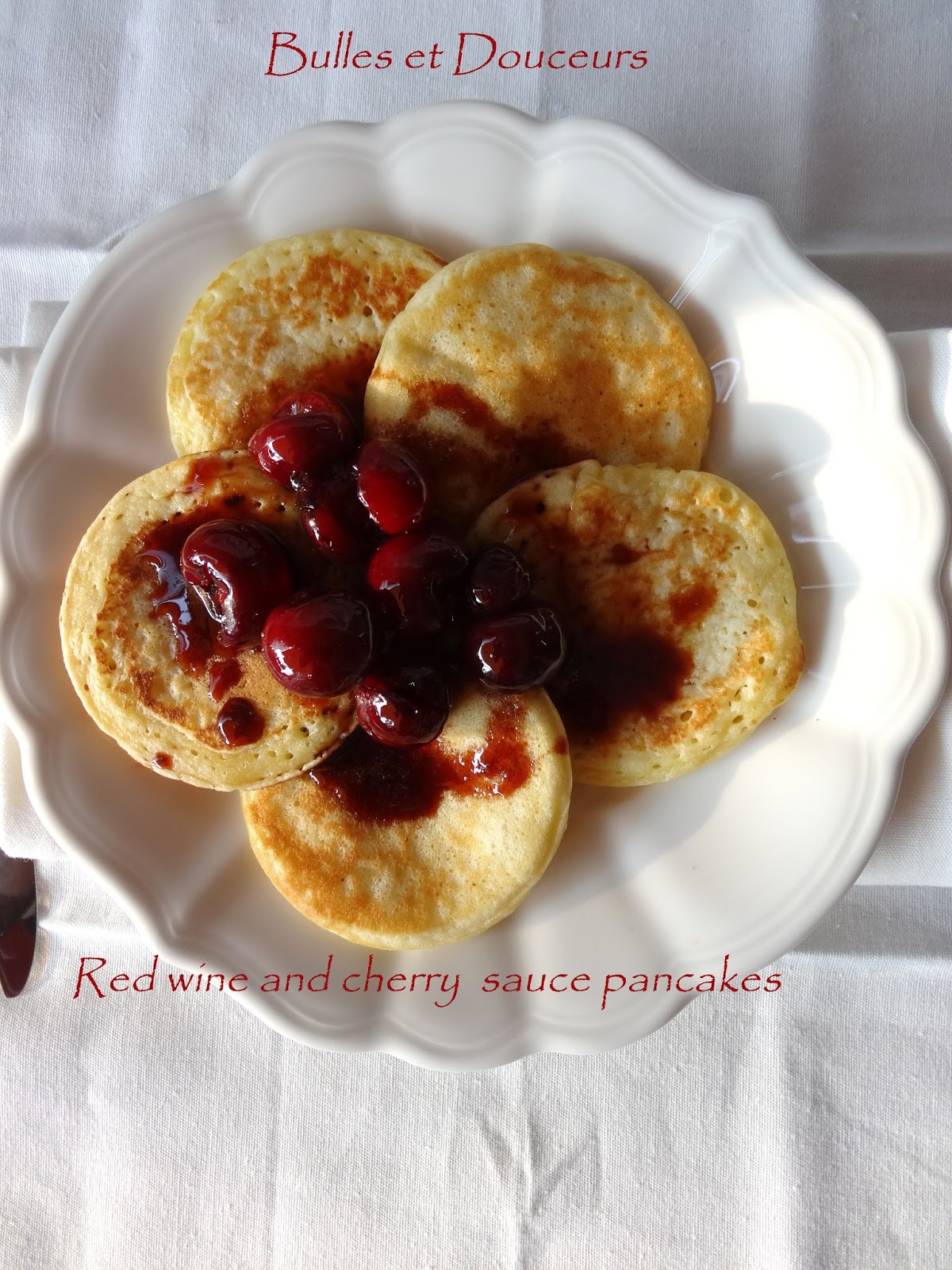 Bulles et douceurs Pancakes with cherries in red wine sauce Pancakes