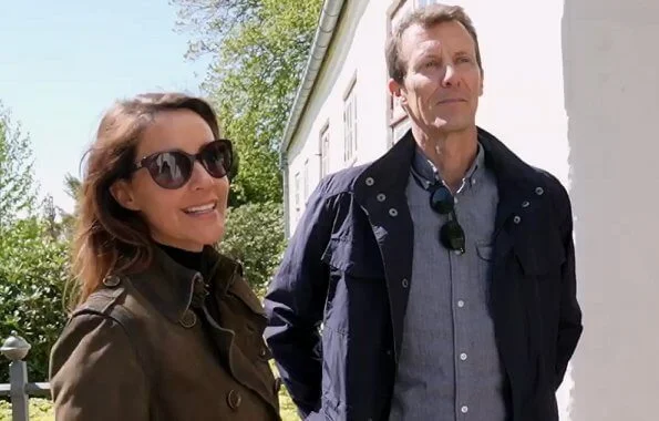 Prince Joachim, Princess Marie, Prince Henrik and Princess Athena. Brown trench coat, Versace sunglasses