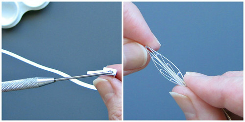fingers showing gluing end of alternate side loop paper petal and pinching tip of paper leaf or petal