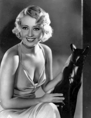 Joan Blondell portrait with cat statue