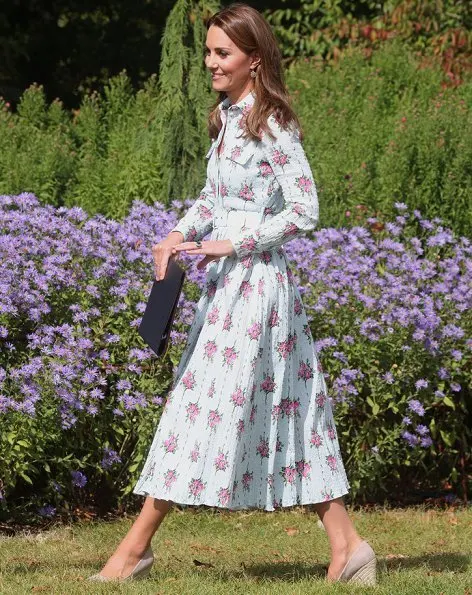 Kate Middleton wore Emilia Wickstead Aurora belted floral-print Swiss-dot cotton-blend seersucker dress and Monsoon fleur wedges