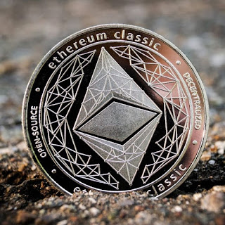 white background and golden color Ethereum Classic coin