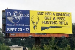http://www.funnysigns.net/buy-her-a-diamond-get-a-free-hunting-rifle/