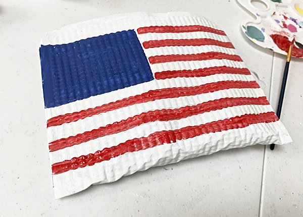 American flag painted on a pouch