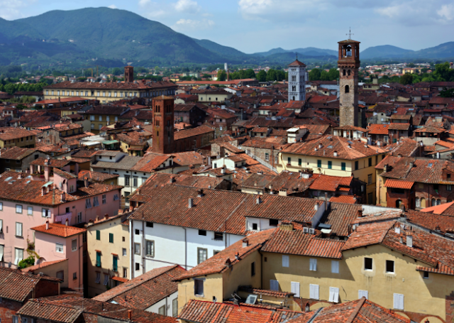 Lucca is a majestic Tuscan city famed for its fully-intact Renaissance walls and medieval clock tower