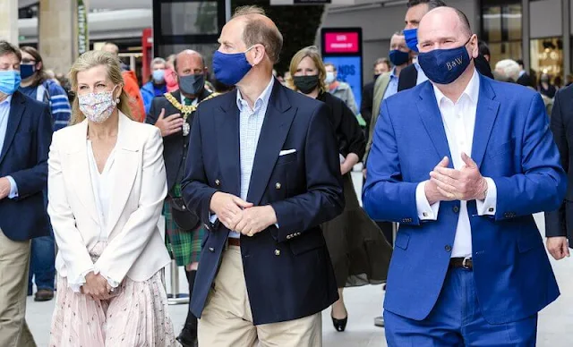 The Countess of Wessex wore a pleated silk midi skirt by Valentino. The Countess wore a pink skirt with white top and blazer