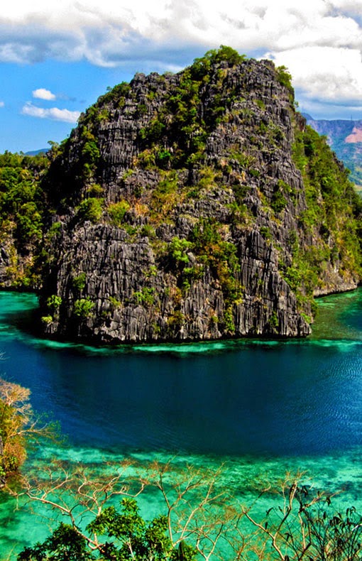 Coron Island is the third-largest island in the Calamian Islands in northern Palawan in the Philippines. The island is part of the larger municipality
