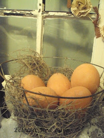 Eclectic Red Barn: Old wire basket with terracotta eggs