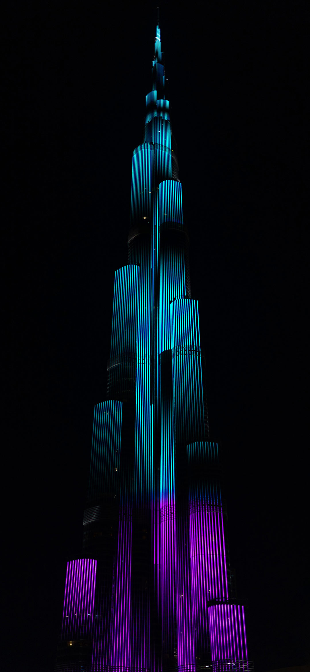 burj-khalifa-green-and-purple-light-illustration-wallpaper