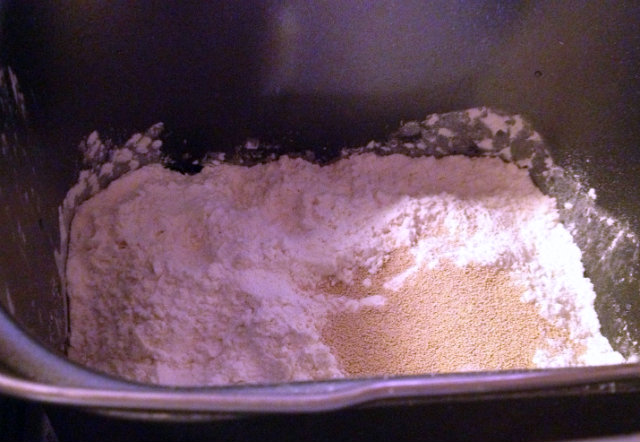 flour and dry yeast in bread machine