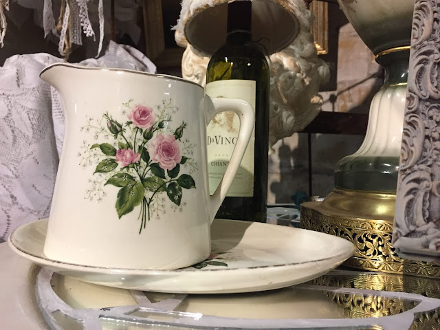 vintage pitcher with pink roses