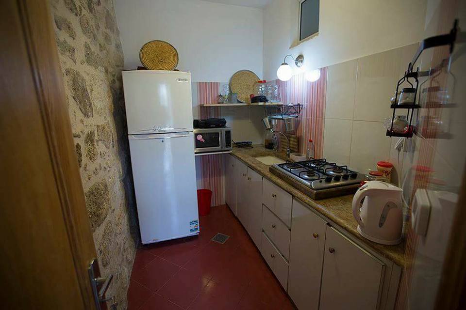 Hostel exchange in Palestine, hospitality, volunteer, barter, trade, food and accommodation, kitchen, sebastia