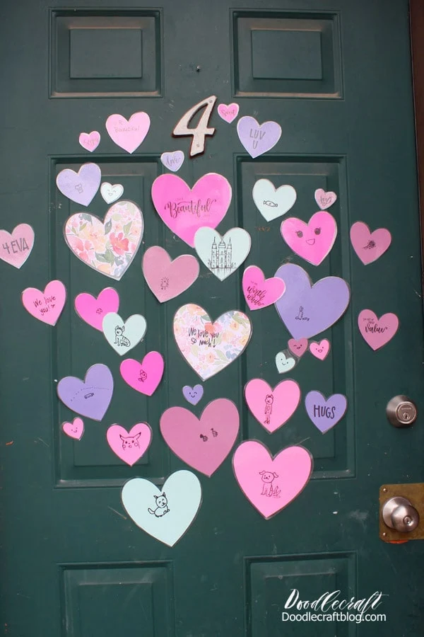 This door was in pretty rough shape. I wish I could paint it and make it look nice, like this neighbors door...but it's an apartment.    But filling the door with hearts is a great way to cover the chipped paint from the worn door.   I wish I could have seen the recipients face when they saw the door. I hope they felt the love we tried to convey. Have you ever given someone a "Heart Attack"?
