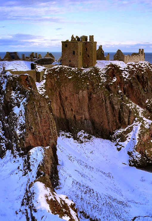  Dunnottar Castle  is a ruined medieval fortress located upon a rocky headland on the north-east coast of Scotland, about 3 kilometres  south of Stonehaven. The surviving buildings are largely