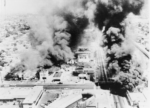 Aerial view of burning buildings, August 13, 1965; Library of Congress