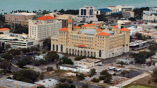The orange-topped Fort Harrison Hotel, left, and the Flag Building across the street are the Church of Scientology's signature buildings in Clearwater. But, as the city moves forward on a $64 million plan to remake the downtown waterfront, a recent buying spree of downtown properties by companies tied to Scientology is raising questions about the church's intentions. [Times (2006)]