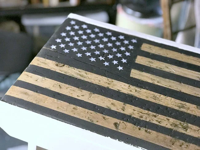 Black and white American flag bench