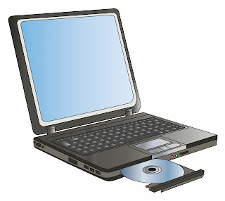 Laptop computer with CD ROM drive open showing CD inserted