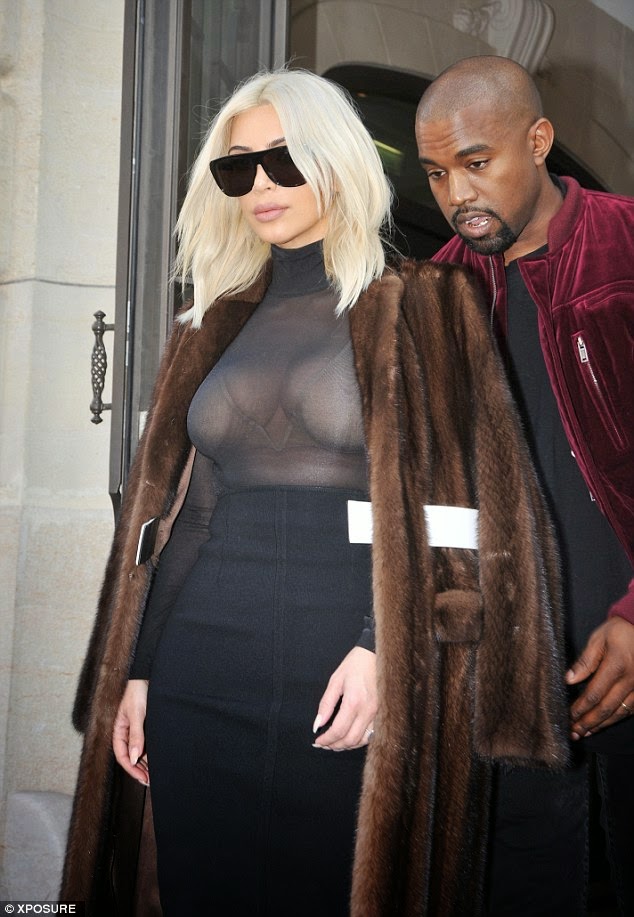 268A4A8E00000578 2989819 image a 94 1426090600226 Kim K steps out in more bizzare outfits in Paris
