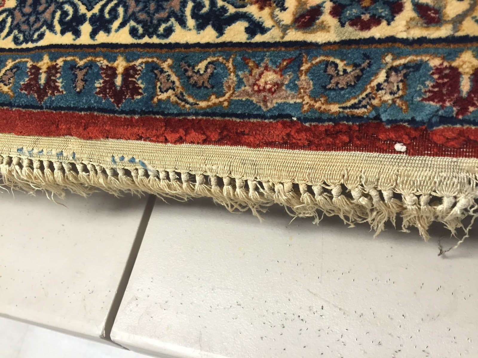 Isfahan Rug Repair Damaged Fringe and Moth Infestation