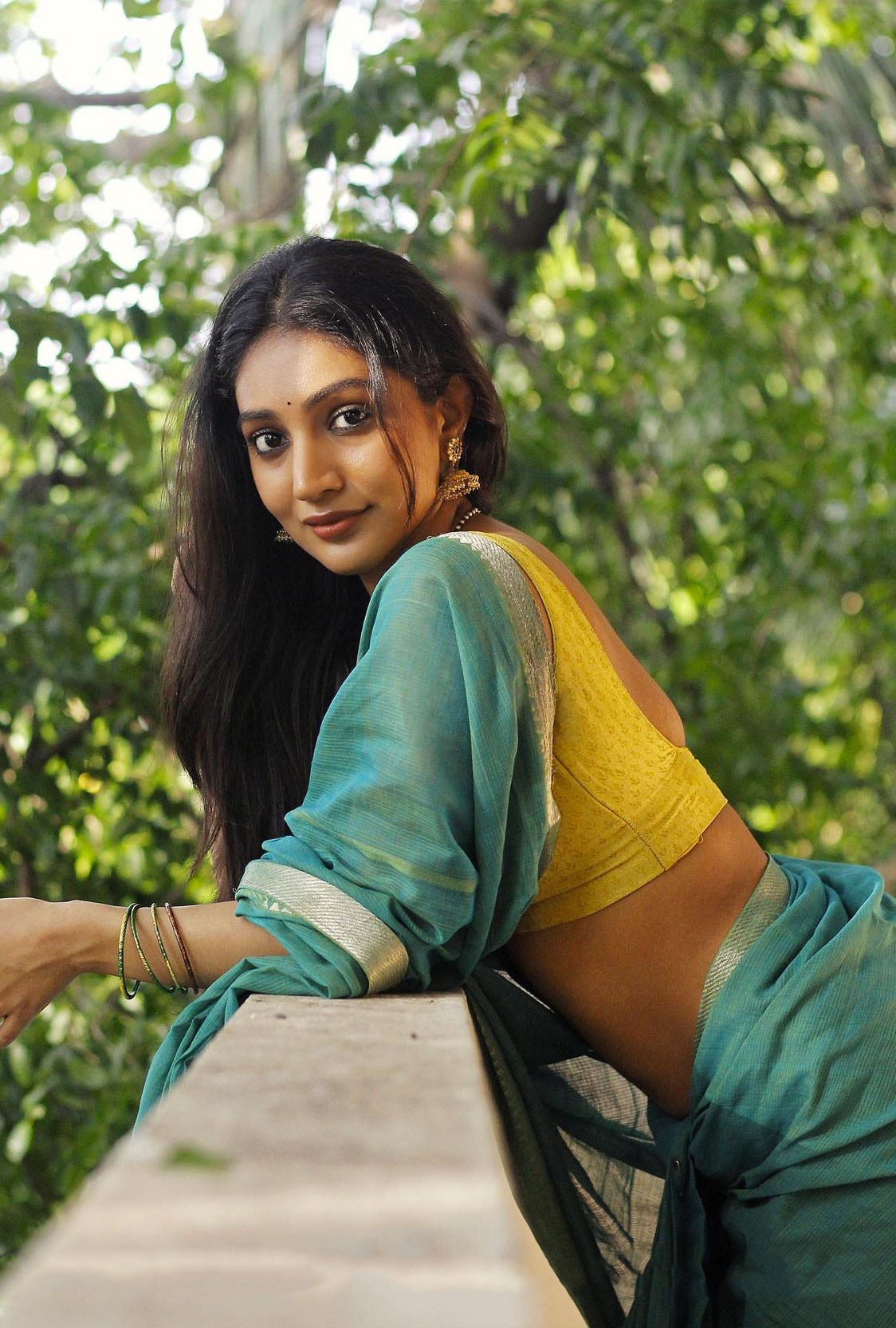 Bommu Lakshmi in green saree photos pics
