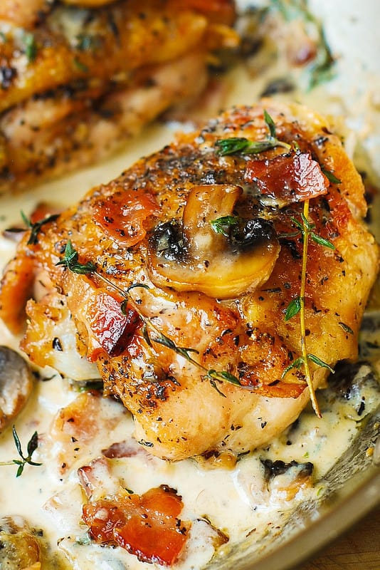Chicken Thighs with Creamy Bacon Mushroom Thyme Sauce Chicken Thighs with Creamy Bacon Mushroom Thyme Sauce