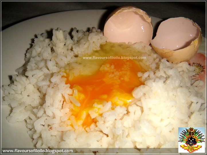 Raw native chicken's egg and hot rice