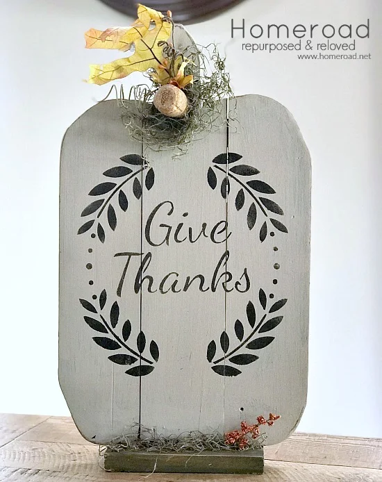 White stenciled pallet pumpkin