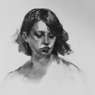 Bridgette's Soul - original charcoal portrait dtawing Female model looking down drawn in charcoal on pale blue paper