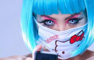 Goth girl wearing weird Hello Kitty face mask