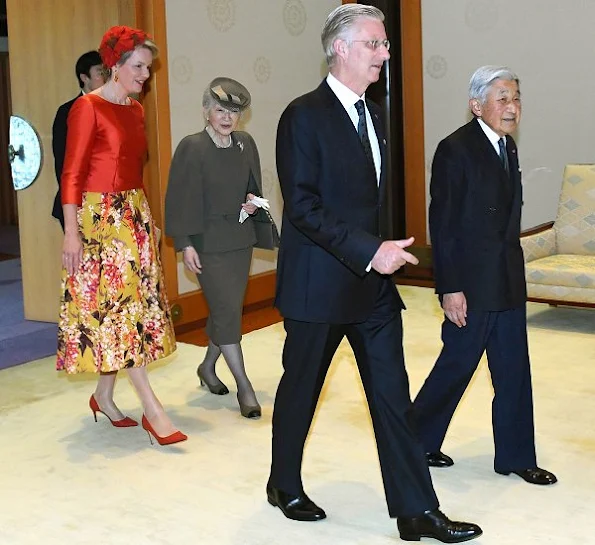 Belgian King Philippe and Queen Mathilde are welcomed by Japanese Emperor Akihito and Empress Michiko upon their arrival at the Imperial Palace. Mathilde Natan Dress